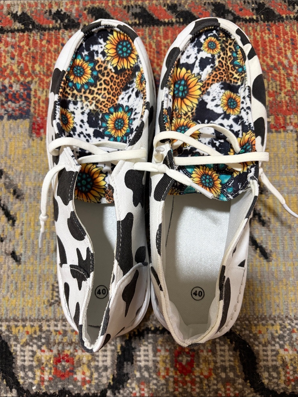 Women’s White & Black Cow Print Slip-On Sneakers with Sunflower Lining